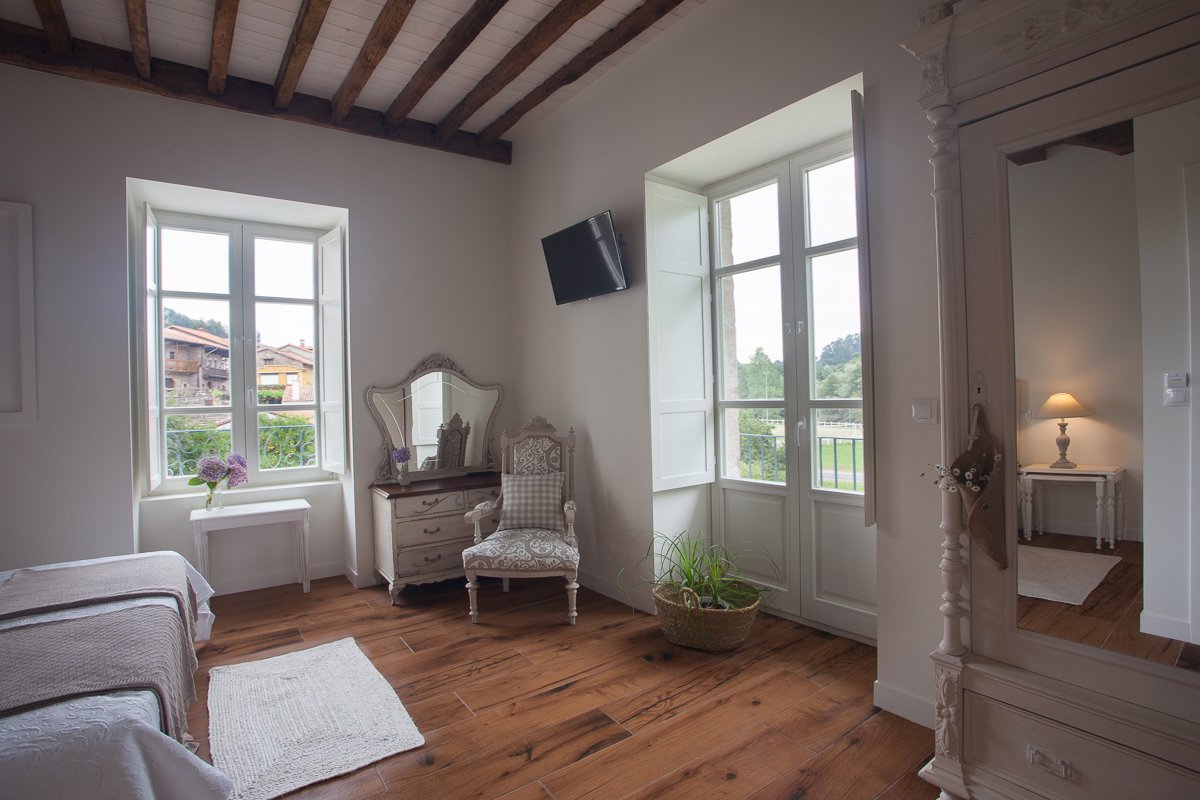 Habitación posada con terraza privada y vistas al jardín